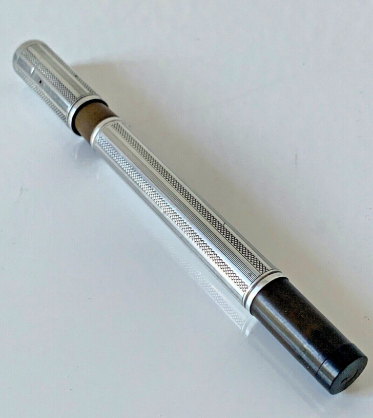 Ancien stylo plume Waterman en argent à plume retractable