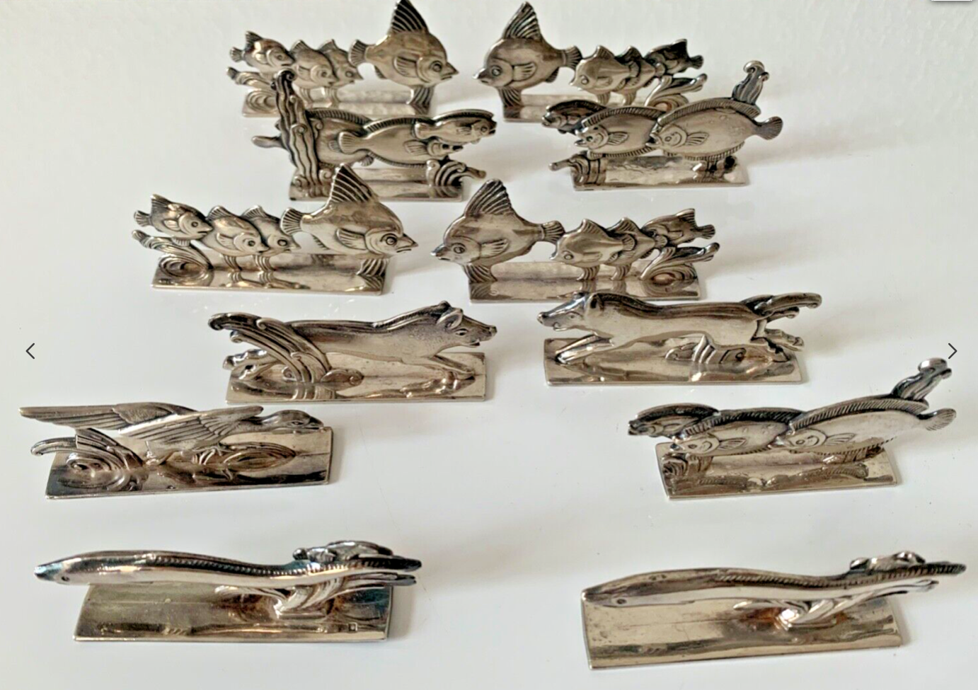 Ancien ensemble de 12 porte couteaux animaux métal argenté poinçonnés  Orbrille