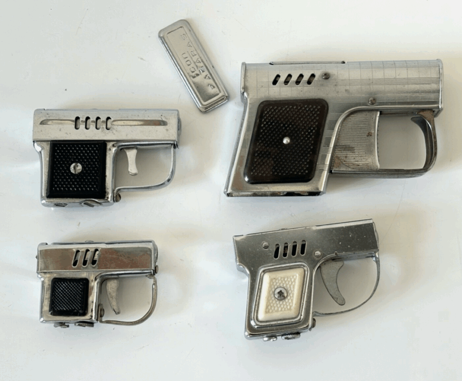 Lot de 4 anciens briquets à essence en forme de revolver