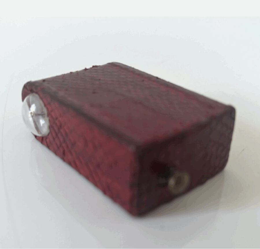Rare ancienne lampe de poche miniature en cuir